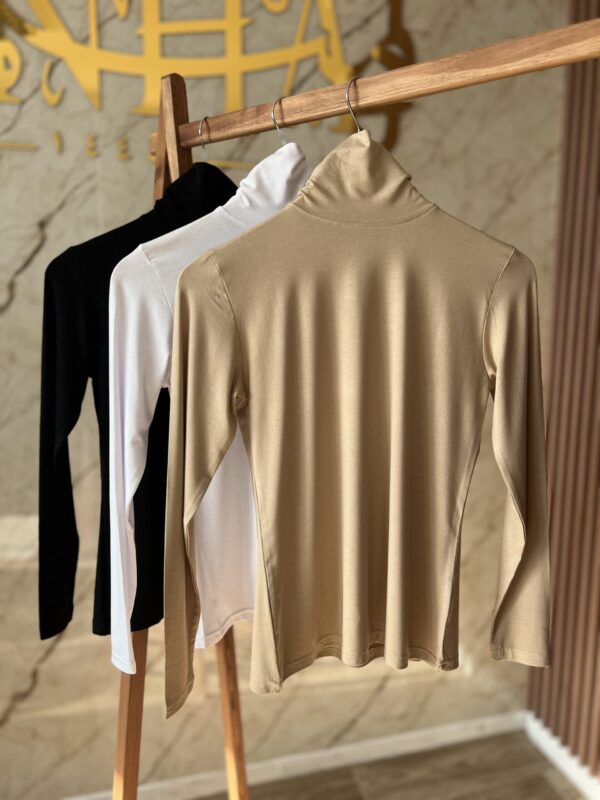 Pull col montant avec manche